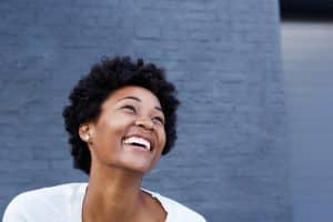 A woman feels happy after stopping drinking.