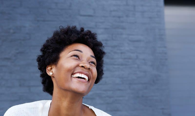 A woman feels happy after stopping drinking.