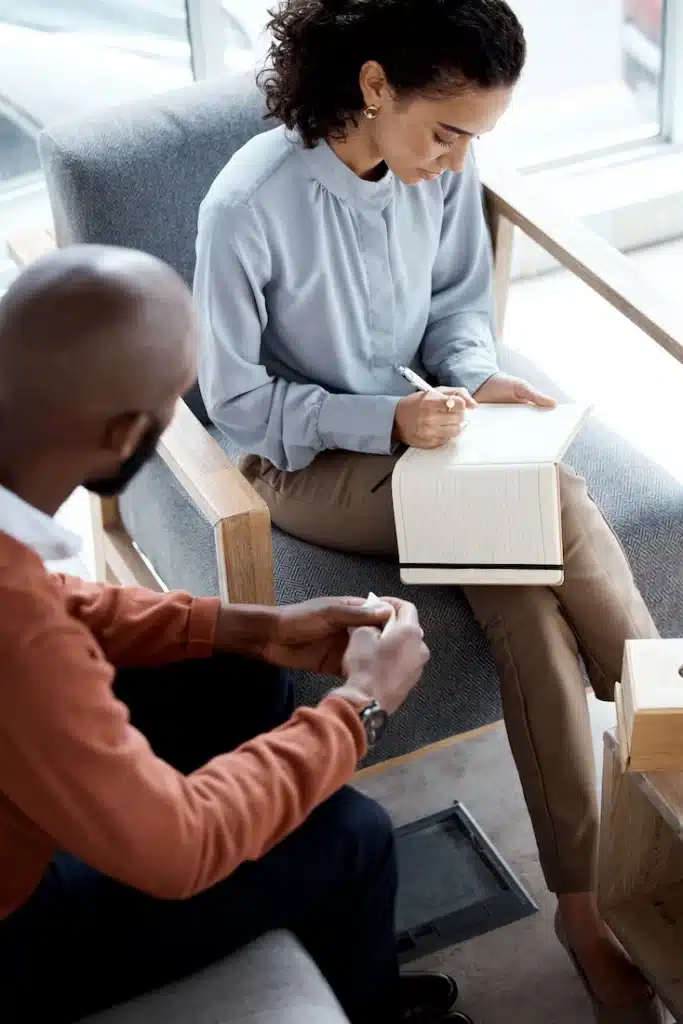 A person participates in therapy at prescription drug addiction treatment center.